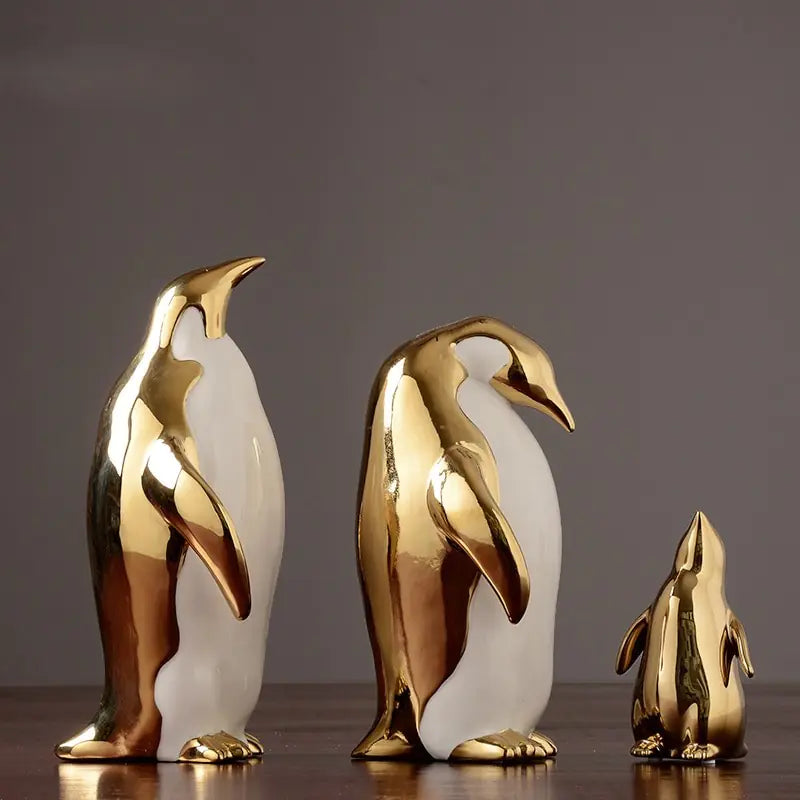 Figuras Decorativas de Pingüinos en Cerámica (Acabado en Oro)
