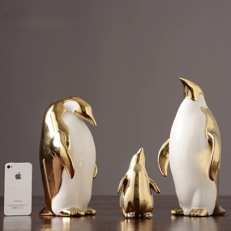 Figuras Decorativas de Pingüinos en Cerámica (Acabado en Oro)